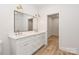 Elegant bathroom with double vanity, large mirror, and a separate shower at 106 Pinecrest Dr, Shelby, NC 28152
