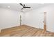 Bright bedroom with light brown vinyl plank flooring and doors to closets at 106 Pinecrest Dr, Shelby, NC 28152