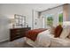 Spacious bedroom with large windows and dresser at 1186 Lost Cove Rd, Indian Land, SC 29707