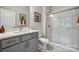 Clean bathroom with gray vanity, white subway tile shower at 1186 Lost Cove Rd, Indian Land, SC 29707