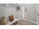 Bright entryway with built-in bench, storage, and coat hooks at 1186 Lost Cove Rd, Indian Land, SC 29707