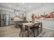 Modern kitchen with gray cabinetry, an island, and stainless steel appliances at 1186 Lost Cove Rd, Indian Land, SC 29707