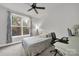 Cozy bedroom with a large window, work desk and carpeted floor at 330 Forsythia Ln, Tega Cay, SC 29708