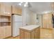 Kitchen with light wood cabinets, tile countertops and island at 5692 Lee Cline Rd, Conover, NC 28613