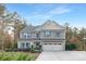 Two-story home with two car garage and landscaping at 6003 Hawk View Rd, Waxhaw, NC 28173