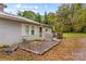 Gray house exterior with a deck and landscaping at 627 Brevard St, Statesville, NC 28677