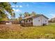 House exterior showcasing the side yard and landscaping at 627 Brevard St, Statesville, NC 28677