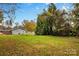 Backyard with shed and mature trees at 627 Brevard St, Statesville, NC 28677