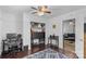 Bedroom with hardwood floors, home office space, and access to another room at 627 Brevard St, Statesville, NC 28677