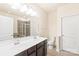 Double vanity bathroom with a shower and bathtub at 9510 Birkwood Ct, Charlotte, NC 28278