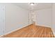 Spacious bedroom with light wood laminate flooring and neutral walls at 9510 Birkwood Ct, Charlotte, NC 28278