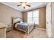 Charming bedroom with ceiling fan and plenty of natural light at 1326 Moonshadow Ln, Shelby, NC 28150