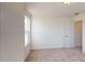 Simple bedroom with carpet, large window, and closet at 2082 Van Buren Rd, Sherrills Ford, NC 28673