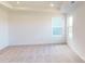 Bright bedroom with neutral carpeting and two windows at 2082 Van Buren Rd, Sherrills Ford, NC 28673