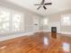 Living room with hardwood floors and a fireplace at 1411 Lineberger Ave, Gastonia, NC 28052