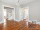 Hardwood floors and access to kitchen and stairs at 1411 Lineberger Ave, Gastonia, NC 28052