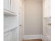 A charming hallway with built-in shelving and updated doors at 1411 Lineberger Ave, Gastonia, NC 28052