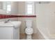 Clean bathroom with bathtub, toilet and vanity at 1411 Lineberger Ave, Gastonia, NC 28052