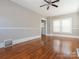 Living room featuring hardwood floors and a ceiling fan at 1411 Lineberger Ave, Gastonia, NC 28052