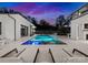 Luxury pool and spa with lounge chairs, perfect for relaxation at 2715 Loch Ln, Charlotte, NC 28226