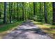 Paved trail through a wooded area in a community at 3221 Maple Ridge Dr, Gastonia, NC 28052