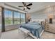 Relaxing main bedroom with a plush bed, accent wall, and large windows at 3244 Stelfox St, Charlotte, NC 28262