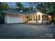 White garage door and sunroom addition at 329 E Allenton St, Mount Gilead, NC 27306