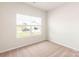 Simple bedroom with carpeted floor and window at 3507 Clover Valley Dr, Gastonia, NC 28052