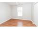 Simple bedroom with wood floors and neutral walls at 612 Carybrook Ct, York, SC 29745
