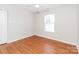 Bedroom with hardwood floors and a window with blinds at 612 Carybrook Ct, York, SC 29745