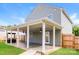 Home with covered patio, fenced yard, and grilling area at 612 Carybrook Ct, York, SC 29745