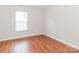 Bedroom with hardwood floors and a window with blinds at 612 Carybrook Ct, York, SC 29745