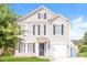 Two-story house with gray siding, a two-car garage, and a well-maintained lawn at 612 Carybrook Ct, York, SC 29745