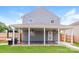 Home with covered patio, fenced yard, and grilling area at 612 Carybrook Ct, York, SC 29745