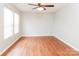 Well-lit bedroom with hardwood floors and ceiling fan at 612 Carybrook Ct, York, SC 29745