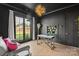 Modern home office features built-in shelving and large window with backyard view at 1017 Maxwell Ct # 5, Marvin, NC 28173