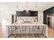 Modern kitchen with white and dark cabinetry, a large island and high end appliances at 1017 Maxwell Ct # 5, Marvin, NC 28173