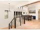Open dining area with a modern chandelier and city view at 1017 Maxwell Ct # 5, Marvin, NC 28173