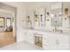 Double vanity bathroom with quartz countertop and brass fixtures at 1017 Maxwell Ct # 5, Marvin, NC 28173