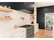 Modern kitchen with white cabinetry, quartz countertops and a professional range at 1017 Maxwell Ct # 5, Marvin, NC 28173