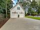 Attached two-car garage with ample space and stylish design at 1401 Heather Ln, Charlotte, NC 28209