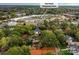 Home's location shown in relation to nearby shopping center at 1401 Heather Ln, Charlotte, NC 28209