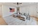 Bright playroom with sectional sofa and large area rug at 1401 Heather Ln, Charlotte, NC 28209