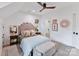 Bright bedroom with a comfortable bed and stylish decor at 1401 Heather Ln, Charlotte, NC 28209