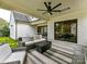 Relaxing outdoor patio with seating and a view of the backyard at 1401 Heather Ln, Charlotte, NC 28209