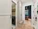 Convenient laundry room with washer, dryer, and built-in storage at 1401 Heather Ln, Charlotte, NC 28209