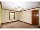 Bright bedroom with wood trim, ceiling fan, and carpet at 206 Swaim Ct, Salisbury, NC 28147