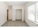 Well-lit bedroom with carpet and a double-door closet at 469 Oates St, Rock Hill, SC 29730