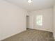 Simple bedroom with neutral wall paint and carpet flooring at 469 Oates St, Rock Hill, SC 29730
