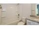 Clean bathroom with granite countertop and a shower/tub combo at 469 Oates St, Rock Hill, SC 29730
